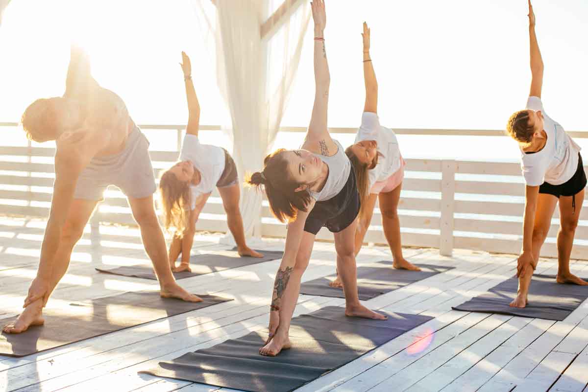 Try local classes or a retreat for your dose of yoga while traveling