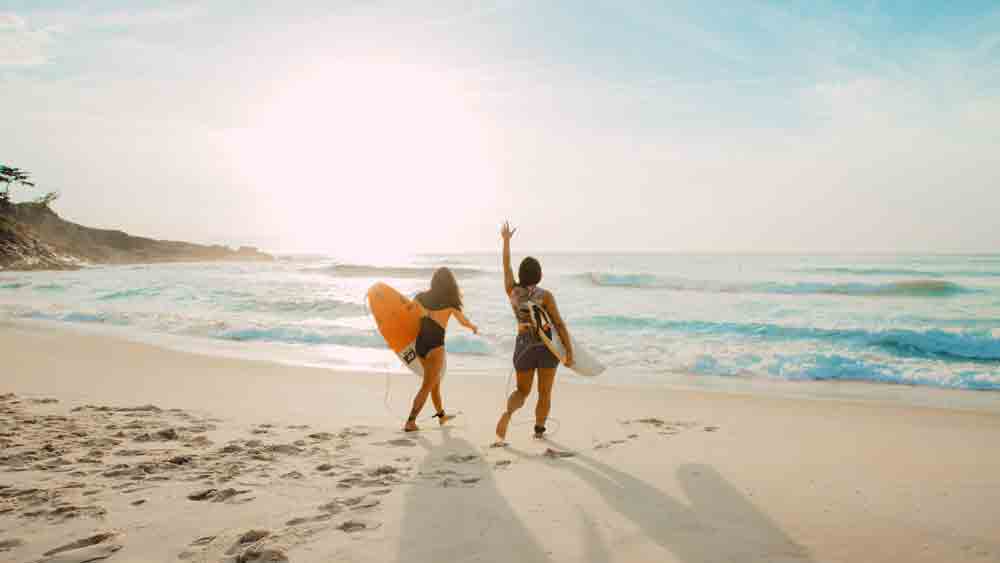 beach surf yoga retreat by elizeu dias on unsplash