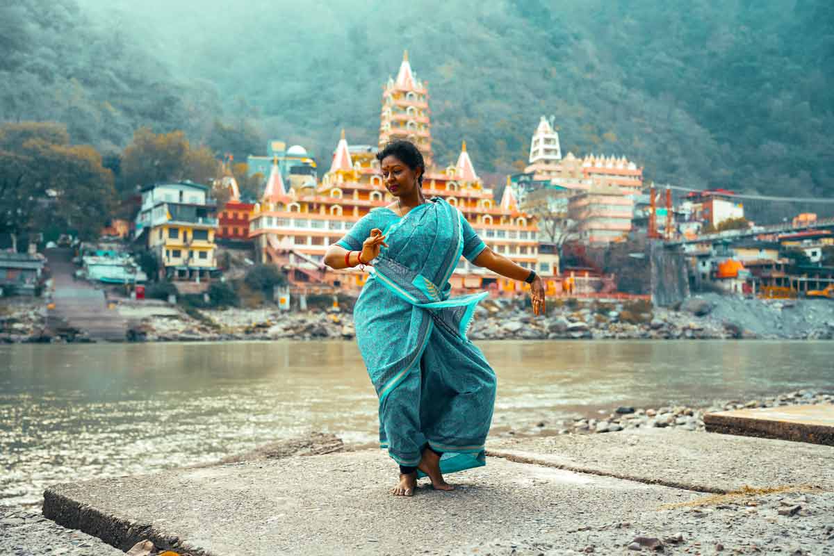 Woman dancing in Rishikesh. Photo by Gokul Gurang on pexels