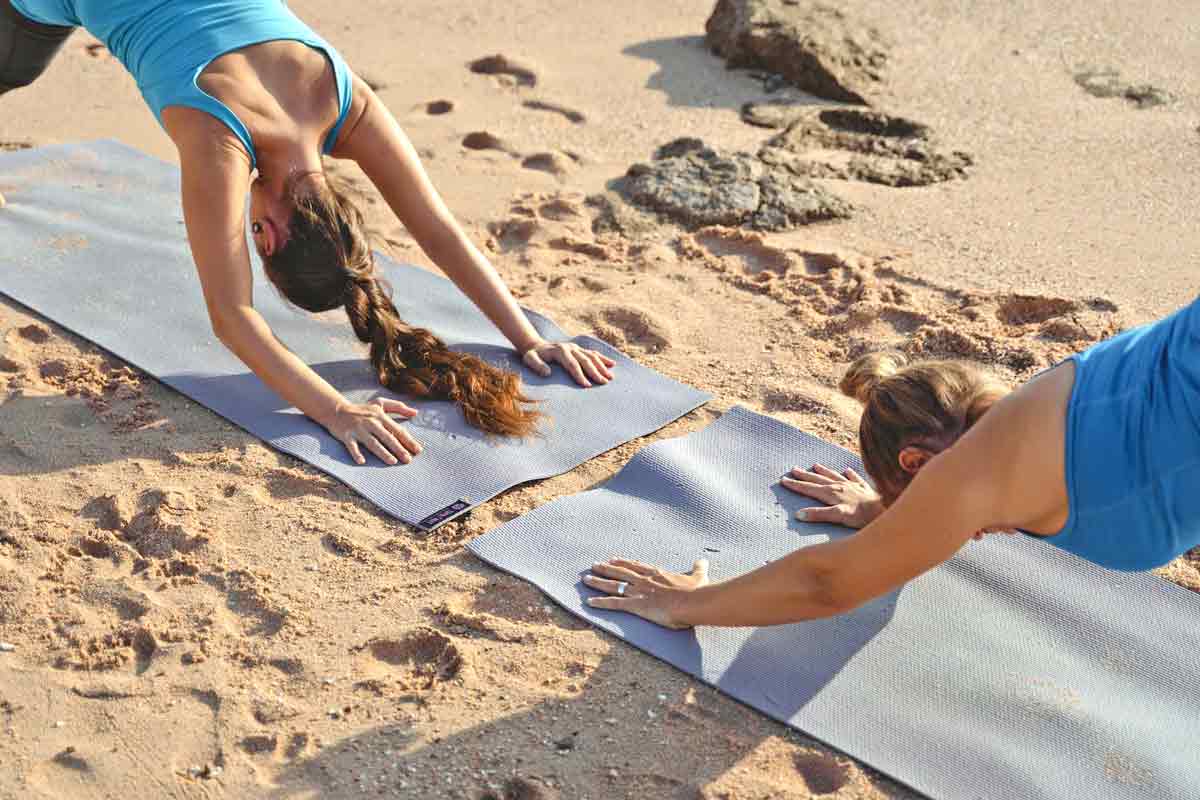 yoga and surf retreats on the beach. Photo by Tima Miroshnichenko on pexels