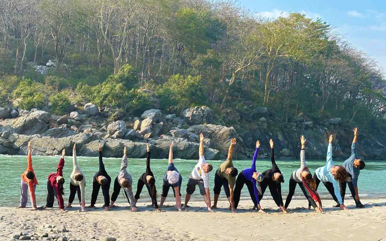 Yoga class on the banks of the holy Ganges river